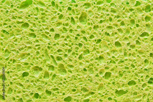 Green porous cleaning sponge texture or background