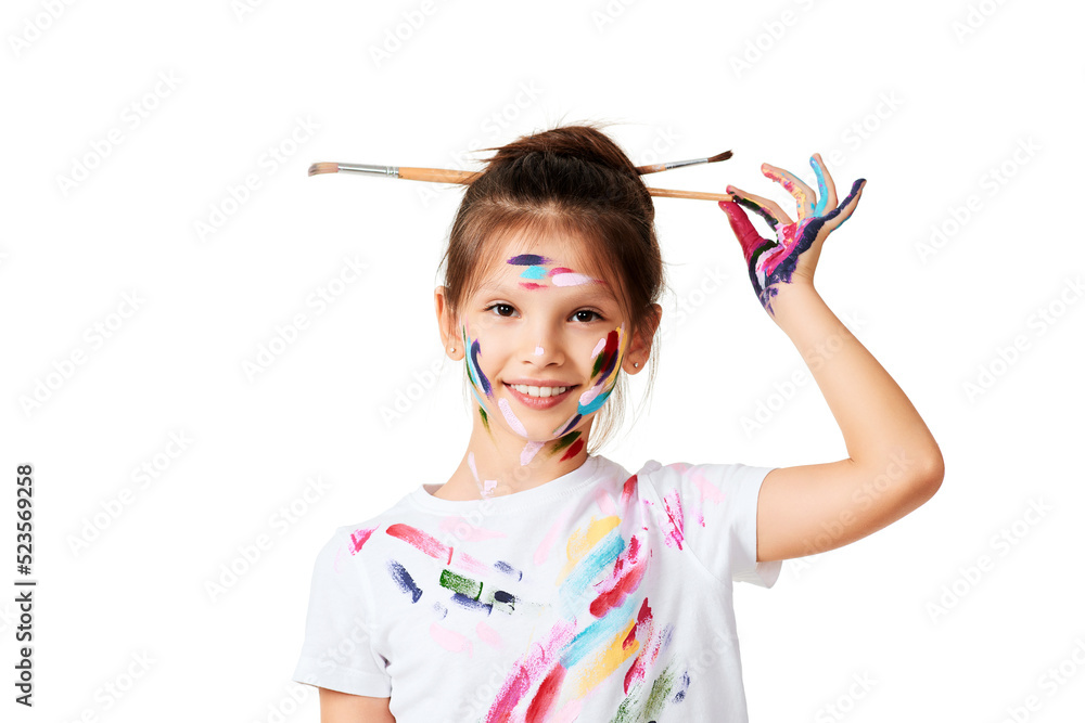 little child girl in colorful paint with paintbrush in hair little child girl in colorful paint with paintbrush in hair