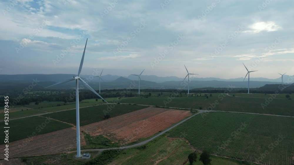 Drone view of farm wind turbine on the mountain,Use wind power to generate electricity,wind energy is mostly the use of wind turbines to generate electricity Drone view of farm wind turbine on the mountain,Use wind power to generate electricity,wind energy is mostly the use of wind turbines to generate electricity