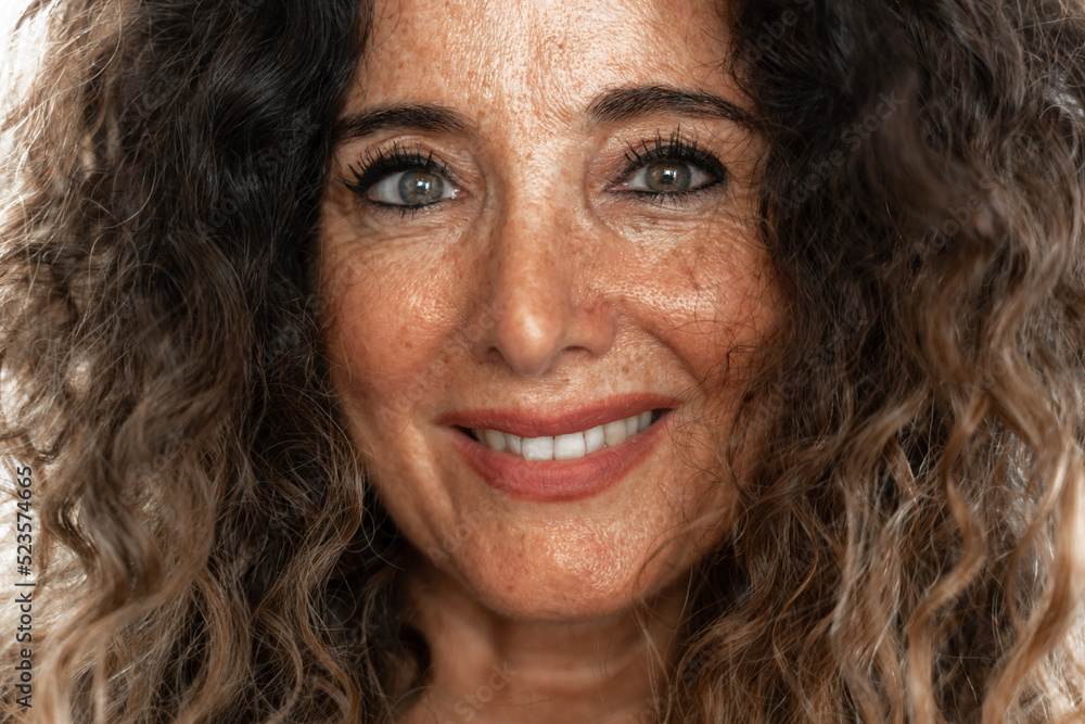 Portrait of an adult woman with curly hair Portrait of an adult woman with curly hair