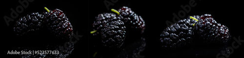 Mulberry berry on black background macro close up
