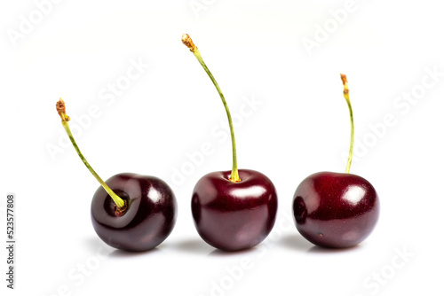 Fresh sweet cherry fruit isolated on white background photo