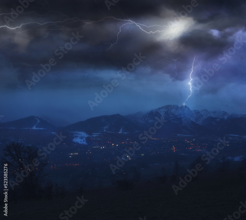 lightning hitting the top of the mountain in Polish peaks