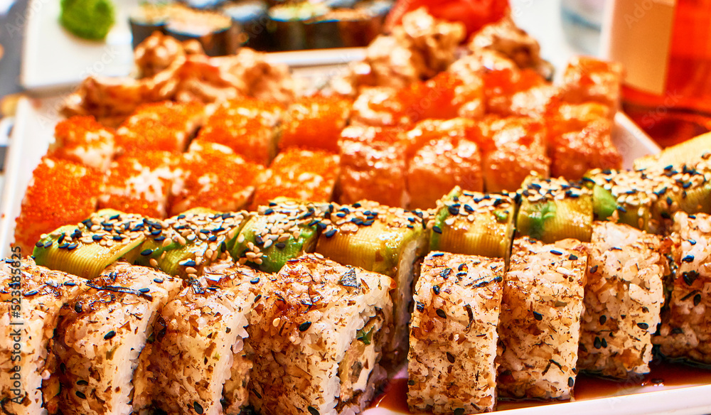 Φωτογραφία Varied set of delicious oriental sushi lounge close up