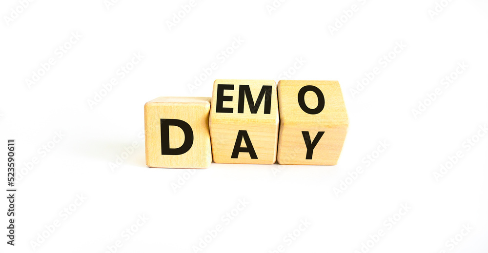 Demo day symbol. Concept words Demo day on wooden cubes. Beautiful white table white background. Business and demo day concept. Copy space. Demo day symbol. Concept words Demo day on wooden cubes. Beautiful white table white background. Business and demo day concept. Copy space.