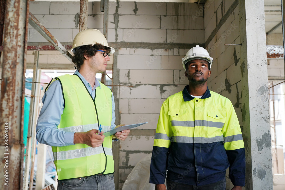 Residential Building. Construction Industry. Caucasian Contractor in the Building. Residential Building. Construction Industry. Caucasian Contractor in the Building.