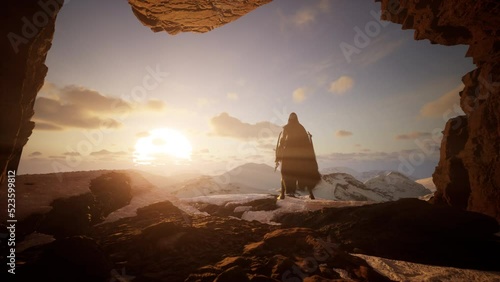 Silhouette of a man, watching epic and fantasy view of snowy mountains from a cave. 3d render photo
