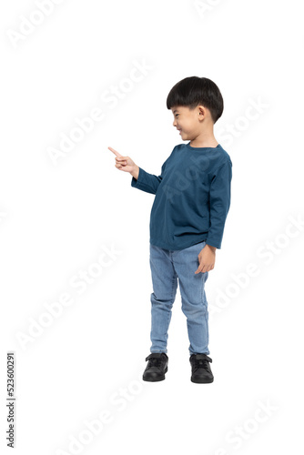 Asian little boy pointing to empty copy space, Full body composition
