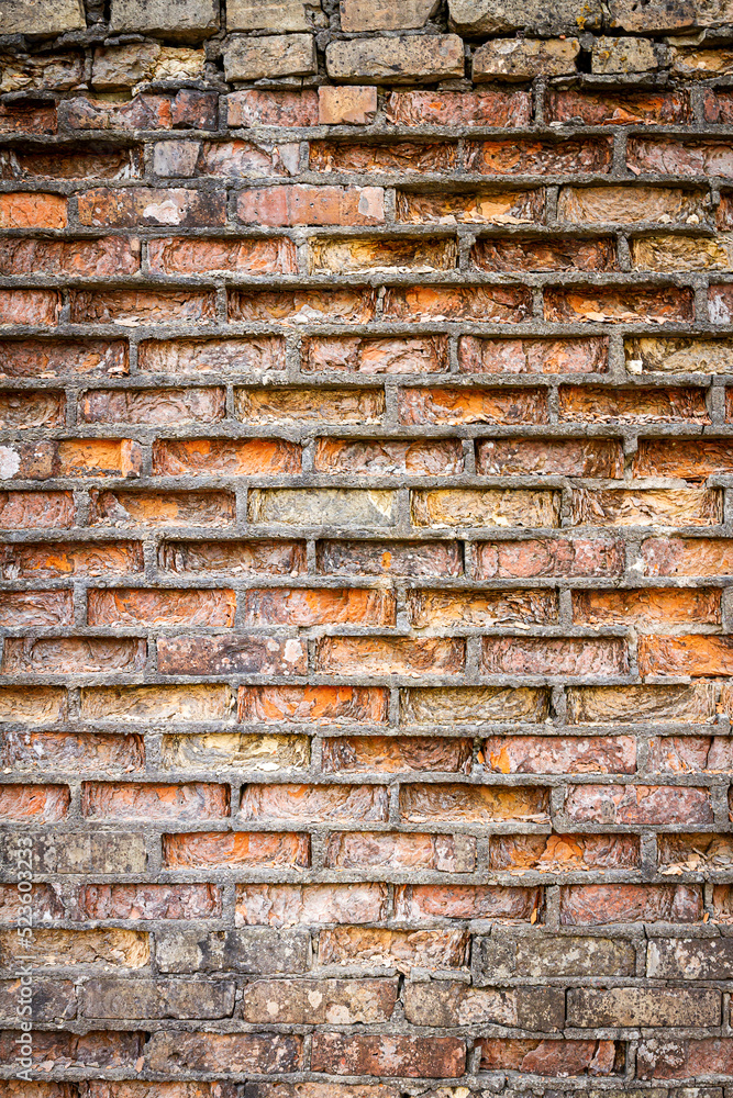 Yellow and red brick wall