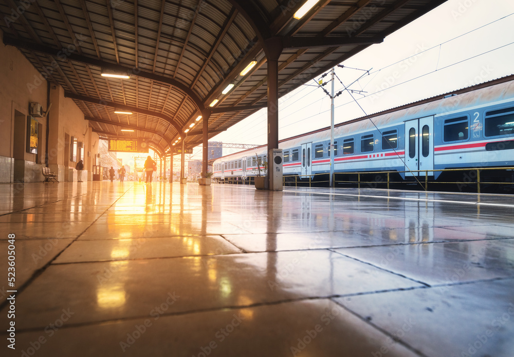 High speed train on train station at beautiful sunrise in Zagreb