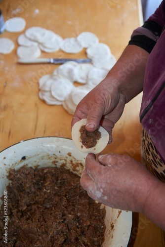 A dish of Azerbaijani national cuisine called Gyurza with deer meat from hunting meat and dough full preparation step by step from start to finish. photo