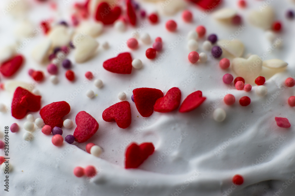 Easter decorated with white sugar glaze, red and white sugar hearts Easter decorated with white sugar glaze, red and white sugar hearts