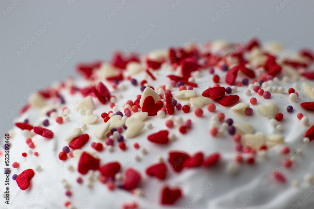 Easter decorated with white sugar glaze, red and white sugar hearts Easter decorated with white sugar glaze, red and white sugar hearts