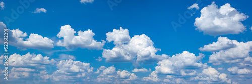 Texture of white clouds on a blue sky, panorama. Cloudy sky, banner