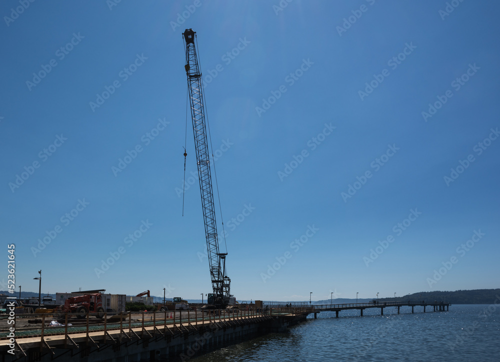 crain at construction site on waterfront