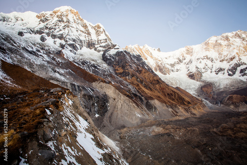 The majestic Annapurna range of the himalayas at first light of sunrise photo