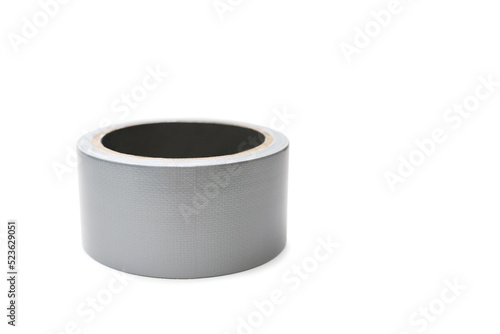 Roll of gray adhesive tape on a white background. Adhesive tape for repair work and cable communications. Adhesive tape for moisture protection or for assembly and packaging. Free space for text