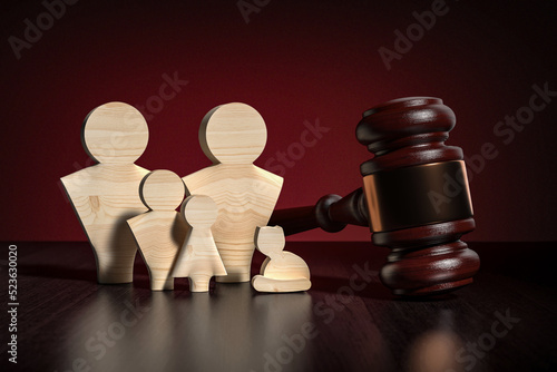 Family law civilian concept - wooden people family figures and wooden gavel on table - 3d render