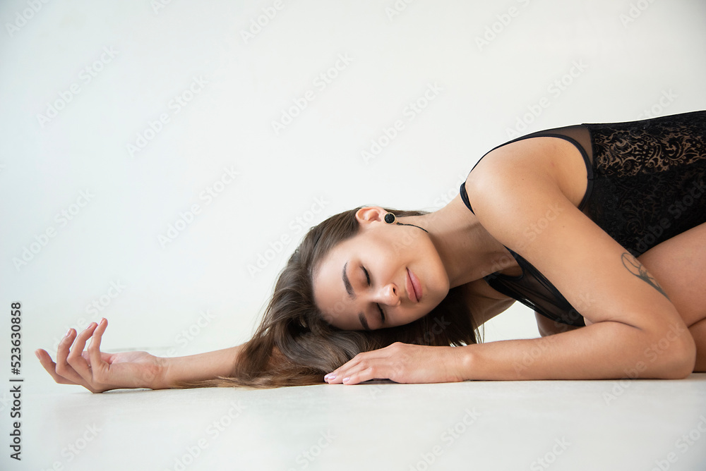 beautiful brunette sport sexy girl with posing in studio on white background beautiful brunette sport sexy girl with posing in studio on white background