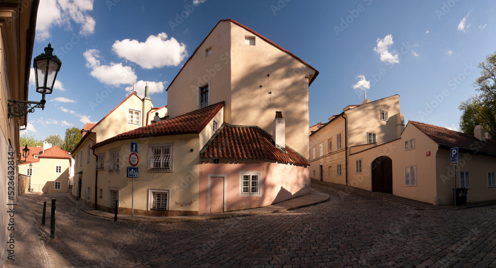 Panorama of a narrow cobblestone street in the centre of Prague