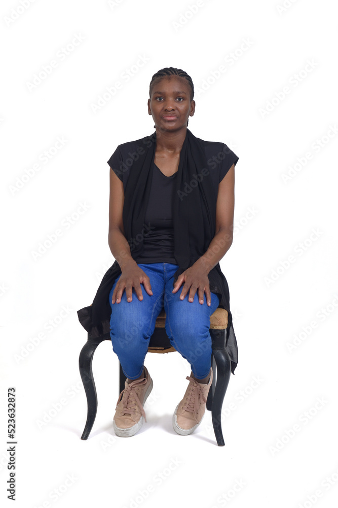 woman sitting on chair on white background