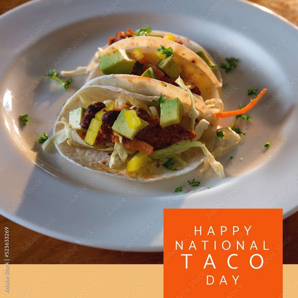 Fototapeta premium Composition of happy national taco day text with tacos on table