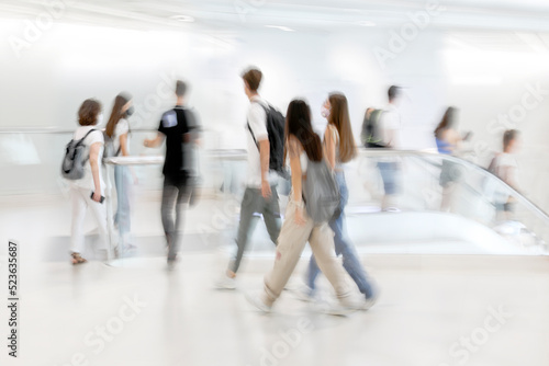 people on moving escalator motion blur © bluraz