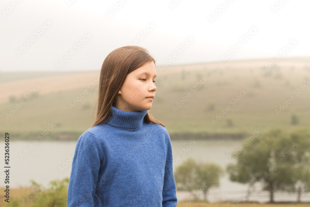 beautiful girl on a walk in a foggy morning near the lake beautiful girl on a walk in a foggy morning near the lake