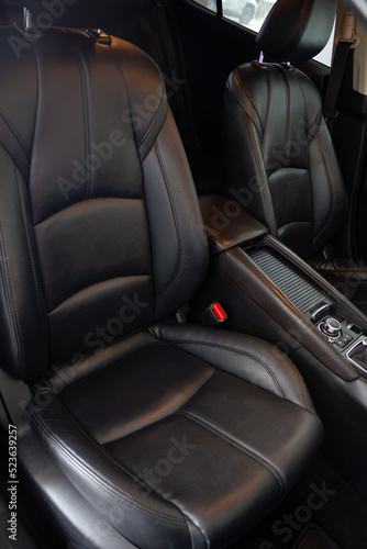 Car interior. Salon of a new modern car. Auto seats.