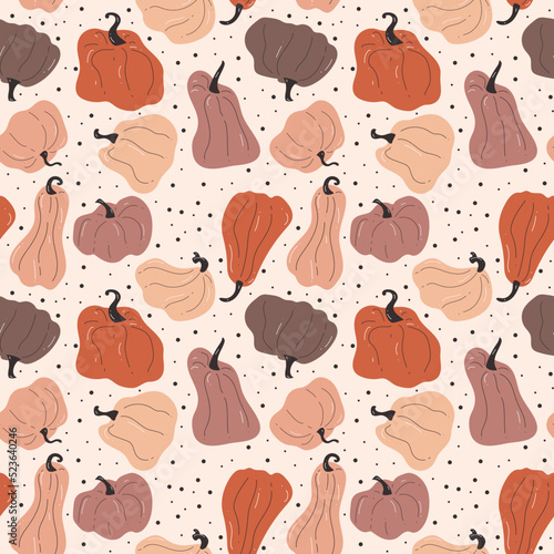 Hand drawn seamless pattern with pumpkins in bright colors with different shapes