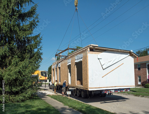 Readying Modular Home to be Lifted off Flatbed  © lawcain