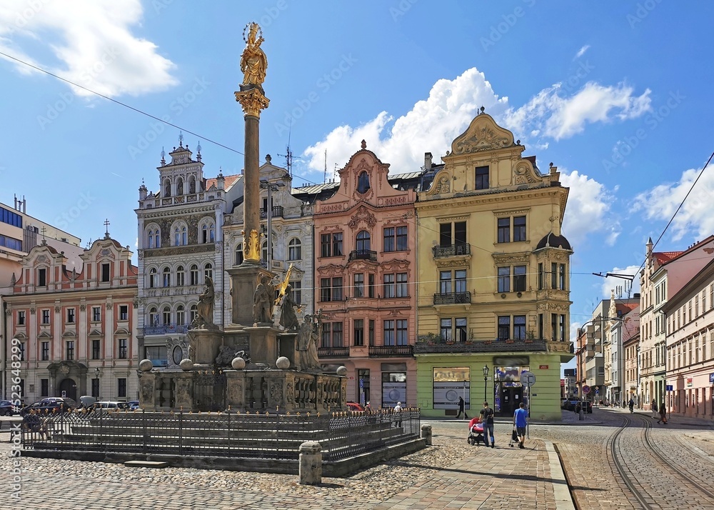 plague column and historical houses on the square in Pilsen