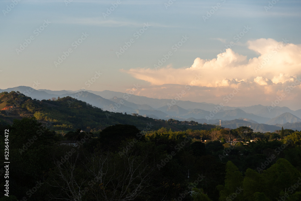 Evening light between mountains in a Colombian landscape.