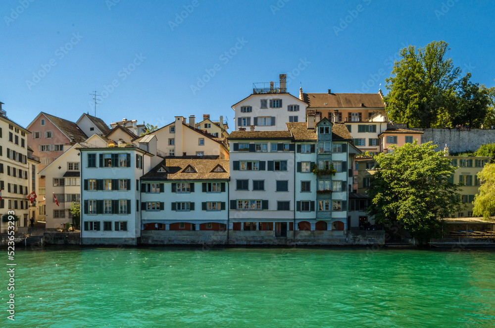 Obraz premium Buildings in Zurich, Switzerland, on the banks of the Limmat river
