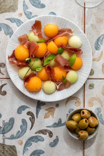 Spanish tapas  melon and ham  olives