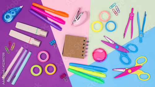 Colorufl creative back to school concept with school supplies on colorufl background. Flat lay