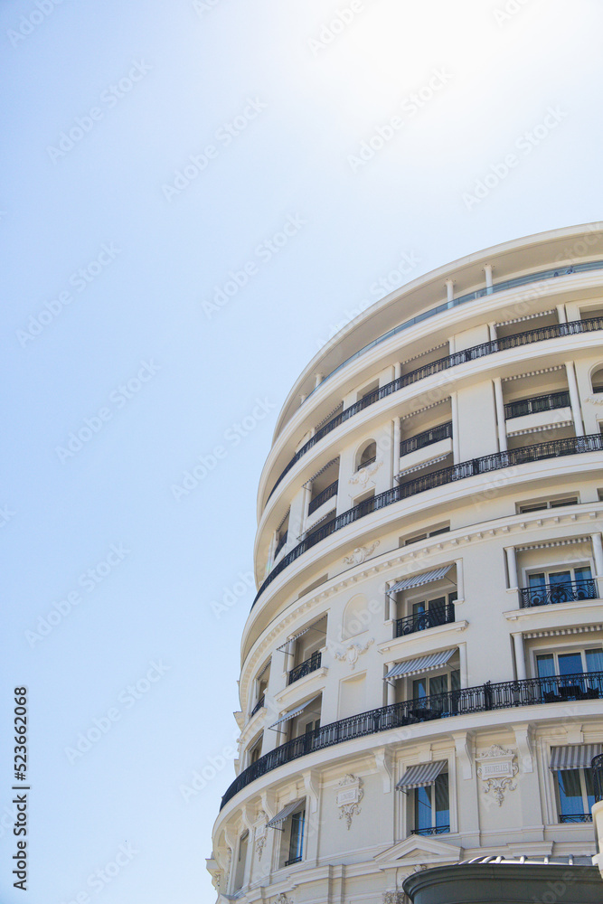 White Circular Building against Blue Sky