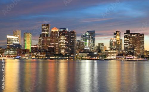 Boston skyline and harbor at dusk with Atlantic Ocean on the foreground, USA 