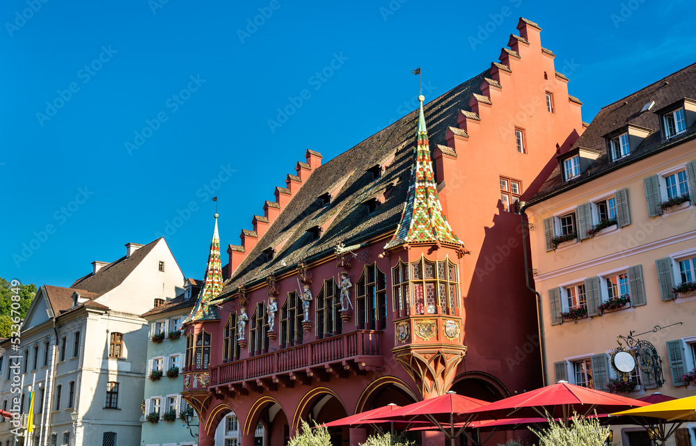Obraz premium The Historical Merchants Hall on the Minster Square in Freiburg im Breisgau - Baden-Wurttemberg, Germany