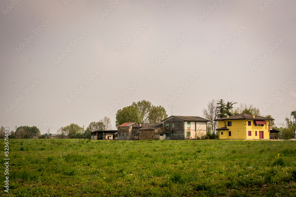 Houses in the field of rural side of Meolo, Veneto, Italy
