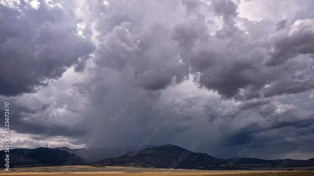 Time lapse of rainstorm moving over the mountains in Cedar Fort, Utah during summer monsoon. Time lapse of rainstorm moving over the mountains in Cedar Fort, Utah during summer monsoon.