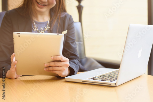 business woman  using tablet and laptop photo