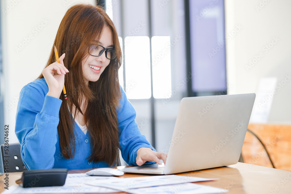 Businesswoman analyse investment marketing data. Businesswoman analyse investment marketing data.