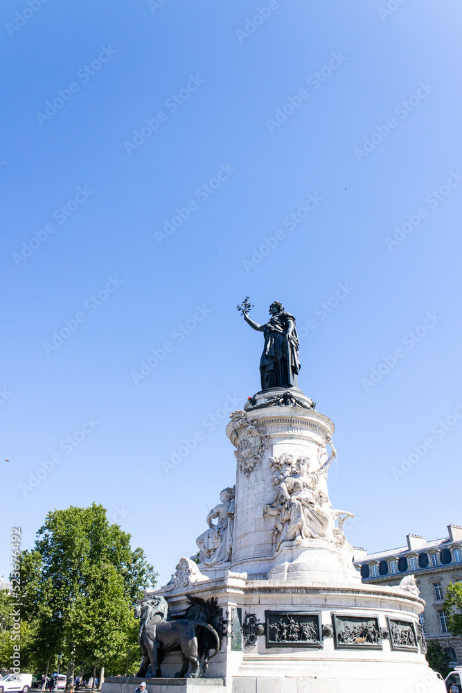 Statue from below on a blue sky