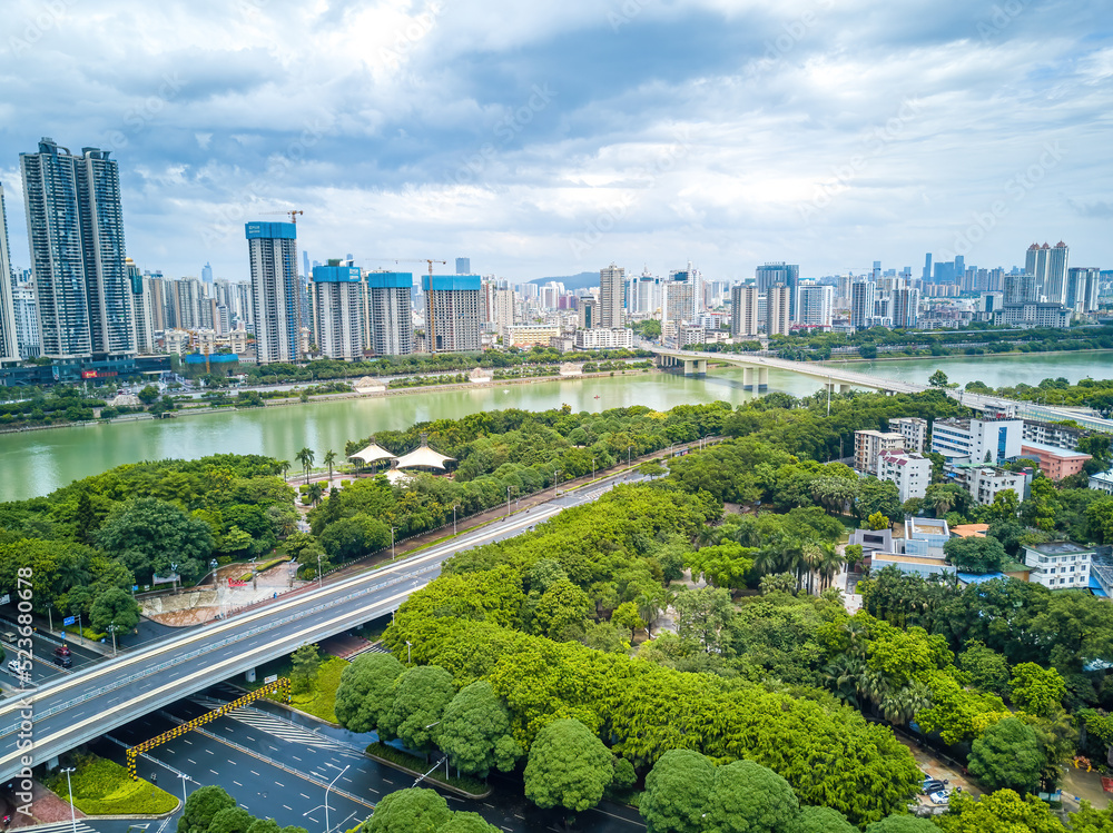Obraz premium City buildings and river bank landscape in Nanning, Guangxi, China