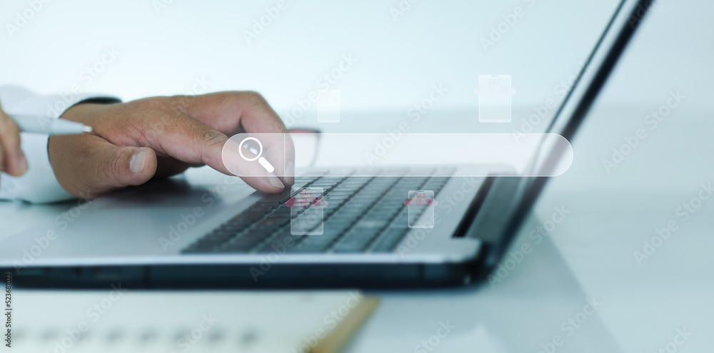 Businessman's hands using laptop to search information technology icons Search Engine Optimization find information Using website search Digital connection global network Search technology concept Businessman's hands using laptop to search information technology icons Search Engine Optimization find information Using website search Digital connection global network Search technology concept