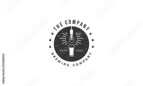 vector graphic logo design. badge, emblem, stamp style logo. vintage old style logo. combination glass and lamp light