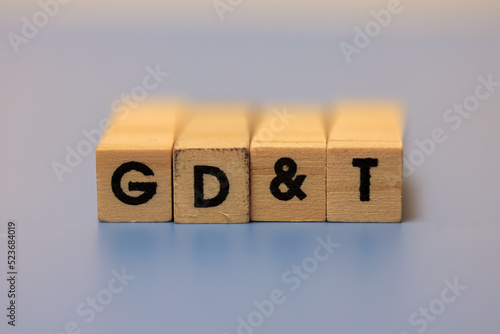 Wooden blocks with Geometric dimensioning and tolerancing text