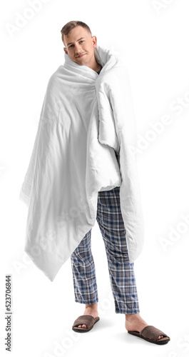 Young man with soft blanket...