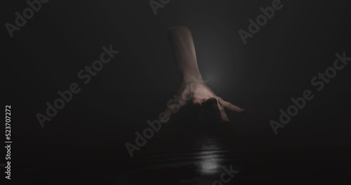 Image of hand walking in dark space
